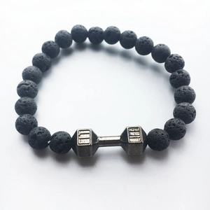Lava stone bead bracelet for men featuring a gray metal dumbbell charm and elastic cord
