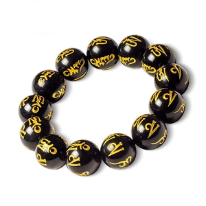 Bracciale di perle di cristallo nero lucido con incisioni dorate del mantra a sei parole