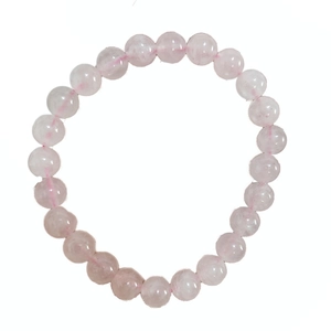 Detailed top view of a pink quartz beaded bracelet with translucent round beads