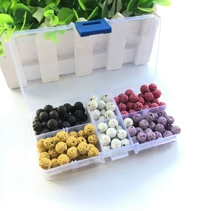 Lava stone bead set with multiple colors in a transparent plastic organizer box