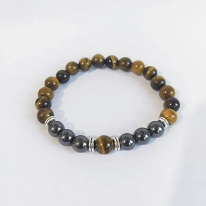 Men's 8mm Tiger Eye and Hematite beaded bracelet with silver spacer accents on white background