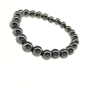 Bracciale elastico minimalista con perle di ematite grigio scuro e finitura a specchio