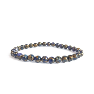 Detailed macro view of 6mm Indian agate and black stone beaded bracelet with gold veins