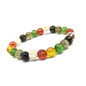 Colorful buddhist prayer bead bracelet with engraved golden mantras on smooth glass