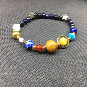 Bracciale sistema solare galassia con perline colorate planetarie e ciondoli a stella