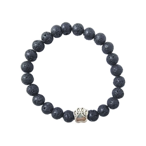 Elastic black lava stone bead bracelet with a silver metal animal paw print charm
