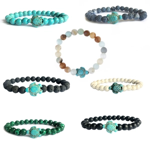 Elastic beaded bracelets with sea turtle pendants in various natural stones and colors