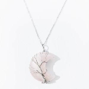 Rose quartz moon pendant with silver tree of life wire wrapping on a delicate chain