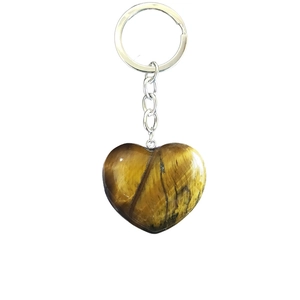 Polished tiger eye heart pendant keychain with golden-brown banded stone textures