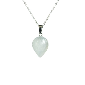 Minimalist silver necklace with a teardrop white opal stone pendant on a white background
