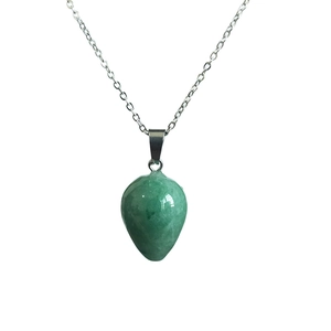 Macro detail of the polished water drop green quartz pendant on a sleek silver chain
