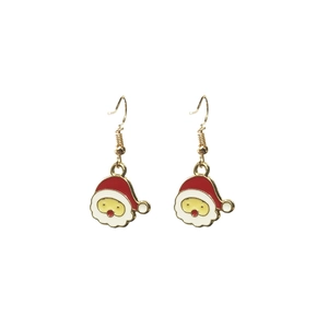 Detail of Christmas Santa Claus dangle earrings with red and white enamel and gold hooks