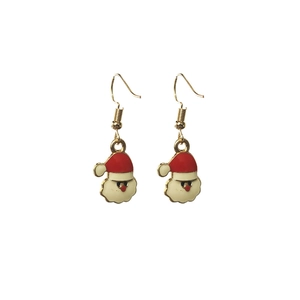 Detail of Christmas Santa Claus hook earrings with red and white enamel finish