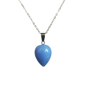 Close-up of a light blue water drop pendant necklace with a fine silver chain