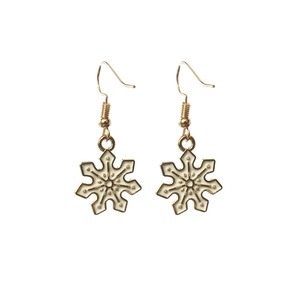 Winter snowflake drop earrings with gold metallic lines and white enamel finish