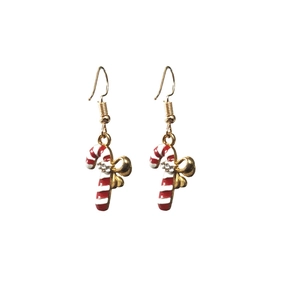 Christmas candy cane drop earrings with red white enamel stripes and gold bow detail