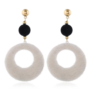 Three-tier drop earrings with gold studs, black fuzzy beads and white plush open circles