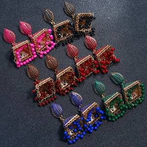 Set of colorful Jhumka bells earrings in bohemian style with gold leaf design