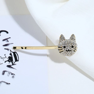 Süße goldene Haarklammer mit glitzerndem Katzen-Design und weißen Strassstein-Details