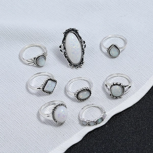 Ensemble de bagues bohèmes en argent avec pierres d'opale et gravures florales