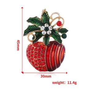 Detailed macro view of red apple brooch with crystal accents and dimensions 45mm by 30mm