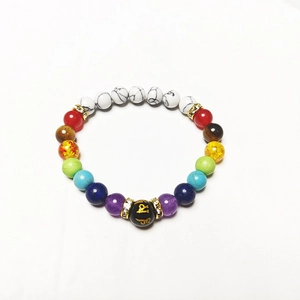 Colorful natural stone bead bracelet with golden engraved mantra charm and crystal spacers