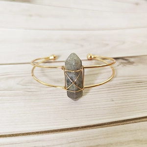 Handmade gold wire-wrapped bangle with hexagonal grey natural crystal stone