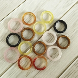 Variety of 6mm natural agate rings with high-polished finishes in multiple vibrant colors