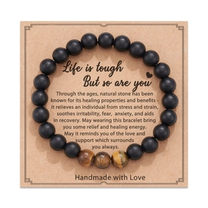 Tiger eye and matte black stone beaded bracelet fixed on inspirational gift card