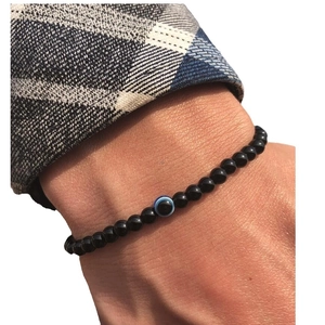 Elastische herenarmband van 6mm natuurlijke zwarte kralen met blauw boze oog bedeltje