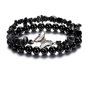 Juego de dos pulseras de piedra negra natural con cuentas redondas y dije de mariposa