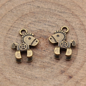 Vintage bronze-tone horse pendants with traditional coin pattern for DIY jewelry crafts
