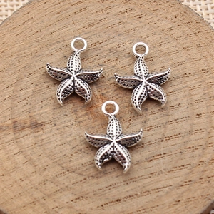 Three vintage silver starfish pendants with textured finish for DIY jewelry making