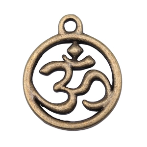 Pendentif Om en bronze vintage avec finition antique pour création de bijoux