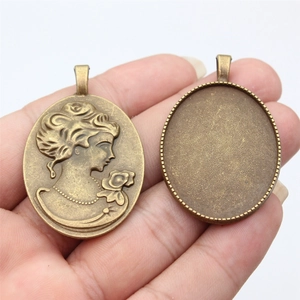 Vintage bronze oval cameo pendant with relief and blank DIY setting tray accessory