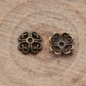 Antique bronze flower bead caps with 8mm hollow four-leaf clover design for DIY jewelry making