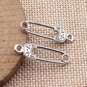 Vintage silver safety pin pendants with embossed texture for DIY jewelry making