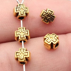 Golden cross-shaped alloy metal beads with vintage texture for DIY jewelry making