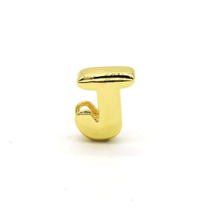 Detailed view of polished golden letter J bubble bead for DIY alphabet bracelet making