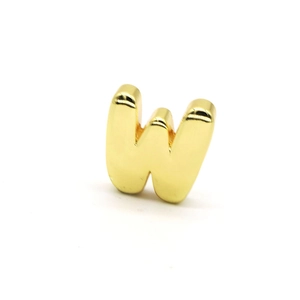 Polished gold metal charm in letter W shape with smooth reflective surface for jewelry