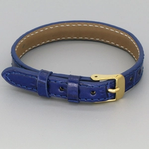 Adjustable dark blue leather strap bracelet with polished gold metal buckle for women