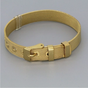 Detailed view of gold mesh belt bracelet showing the buckle design and woven texture