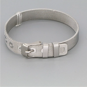Detail of silver mesh bracelet showing adjustable buckle and stainless steel Milanese weave