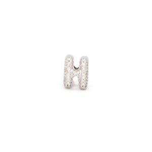 Macro detail of H letter bead featuring cubic zirconia pavé inlay in silver finish