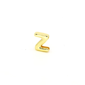 Macro detail of 3D balloon-style golden letter Z pendant for DIY bracelet and necklace