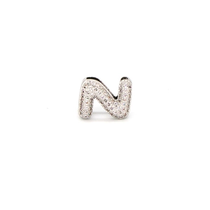 Close-up of bubble letter N pendant with micro-pave zircons in polished silver finish