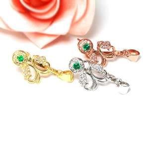 Elegant 925 sterling silver butterfly pendant with green gemstone and white zircon stones