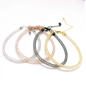 Mesh tube bracelets with sparkling crystals in silver, rose gold, black, and gold finishes