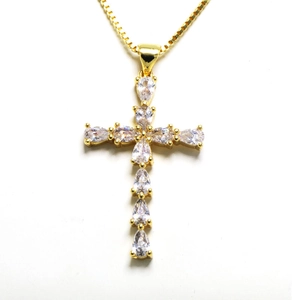 Classic gold cross necklace for women featuring teardrop cut zircons on a delicate box chain