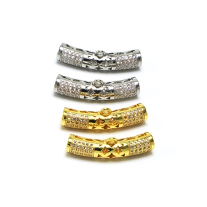 Detail of gold and silver curved tube pendant connectors with pavé cubic zirconia